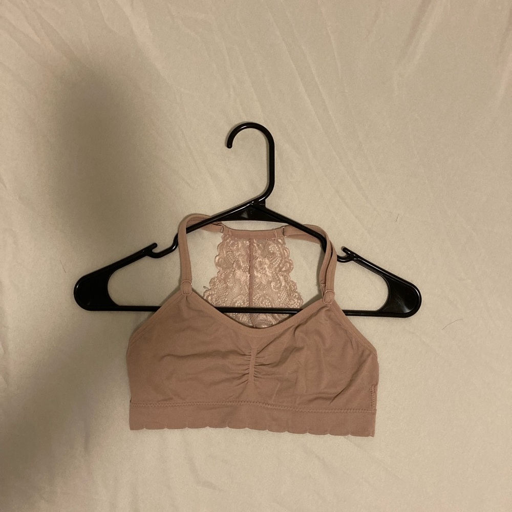 It's a light pink sport bra size small